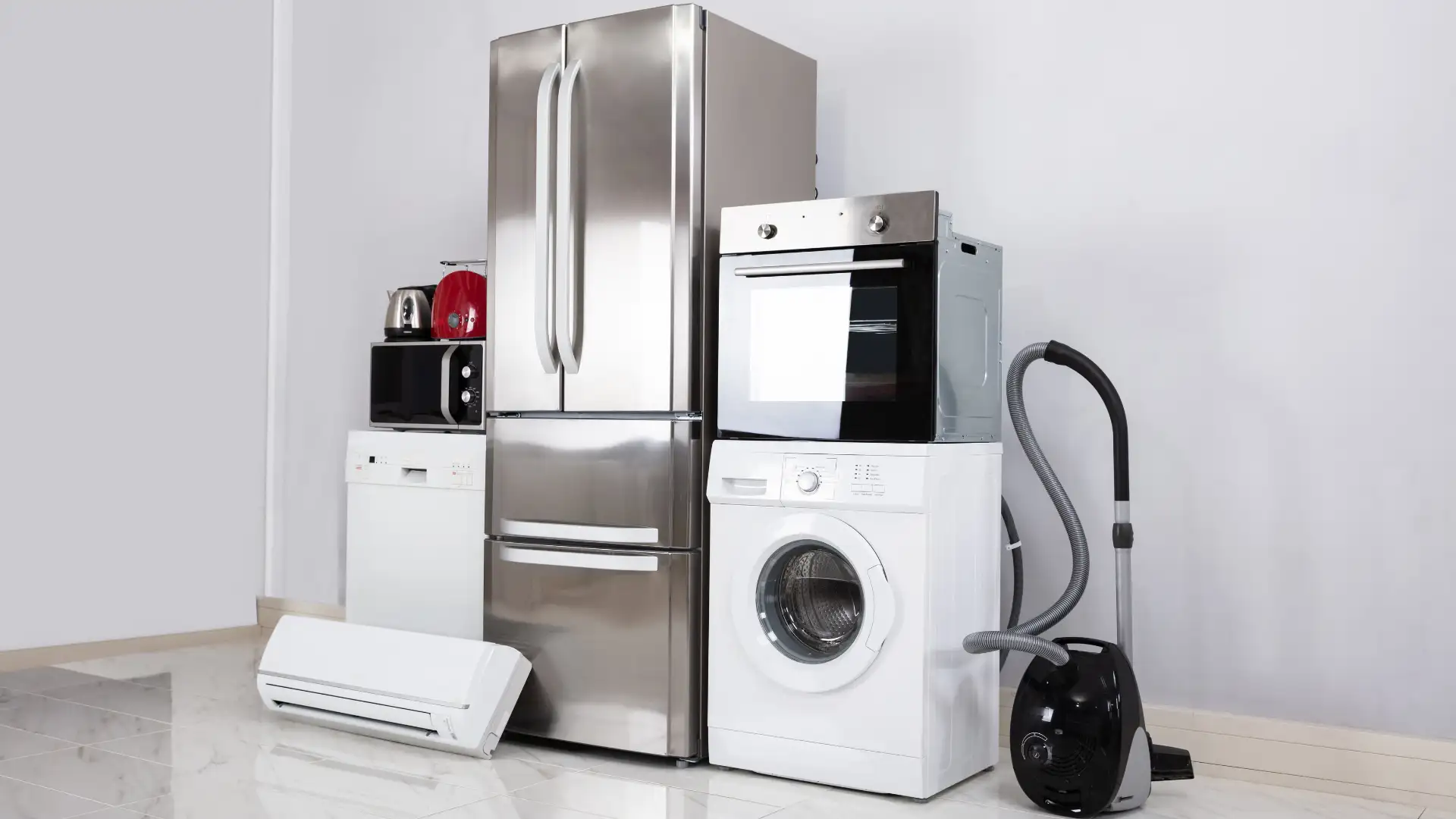 Modern home appliances including a refrigerator, oven, washing machine, vacuum cleaner, and microwave.