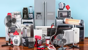 Various household appliances including a refrigerator, microwave, blender, coffee maker, fan, and vacuum cleaner.